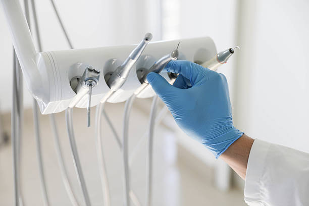 Professional Invisalign Clear Aligners technician working in Fair Plain, MI